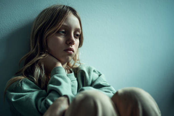 Isolation girl at home. sad or anxiety concept.